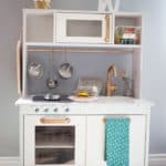 Duktig toy kitchen hack customized with pale green paint and gold spray paint