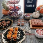 halloween themed food table with allergy free treats
