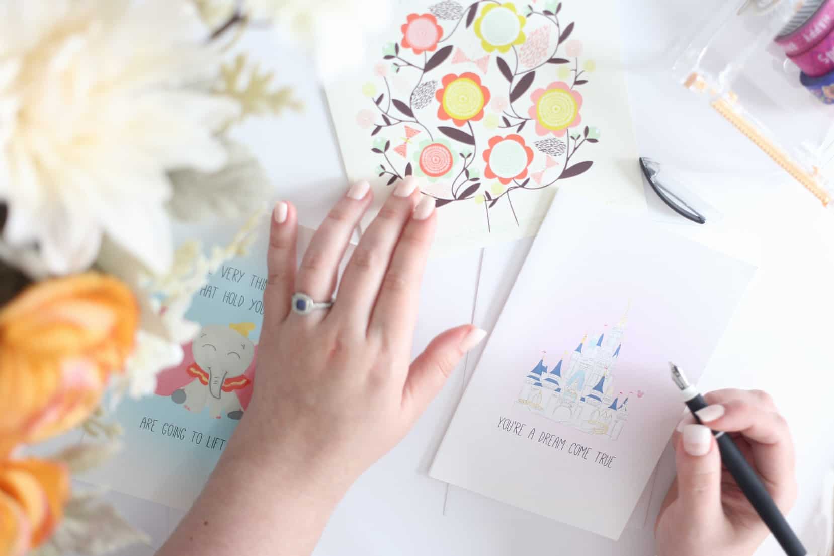 three card against a white background 